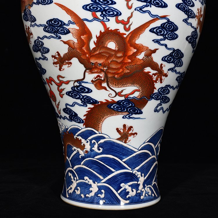 Qing Dynasty Qianlong blue and white alum red Guanyin vase