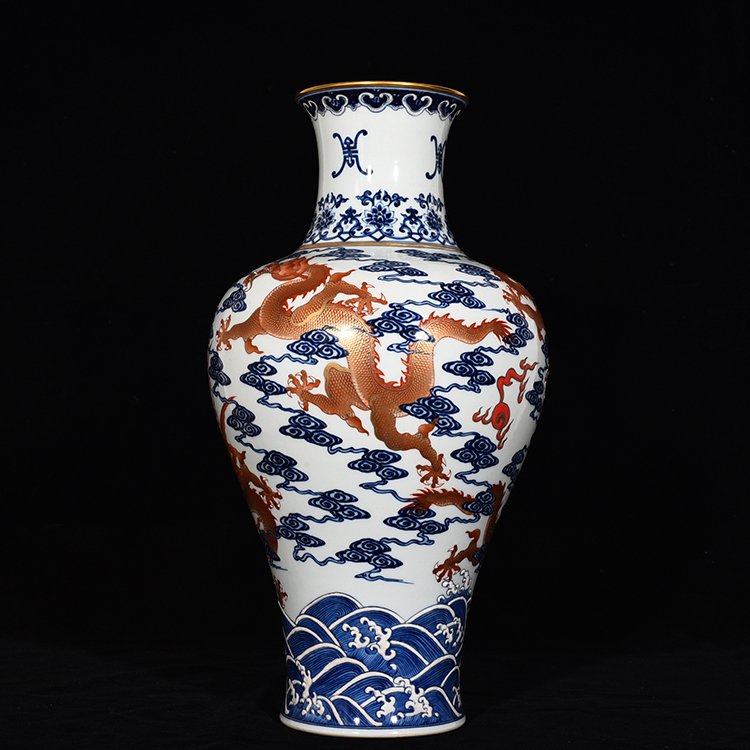 Qing Dynasty Qianlong blue and white alum red Guanyin vase
