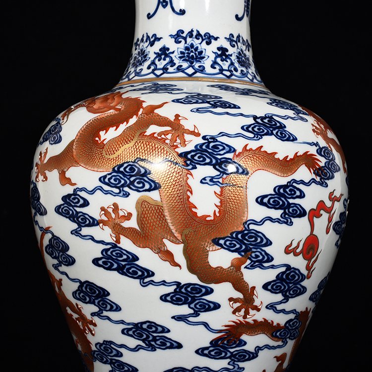 Qing Dynasty Qianlong blue and white alum red Guanyin vase