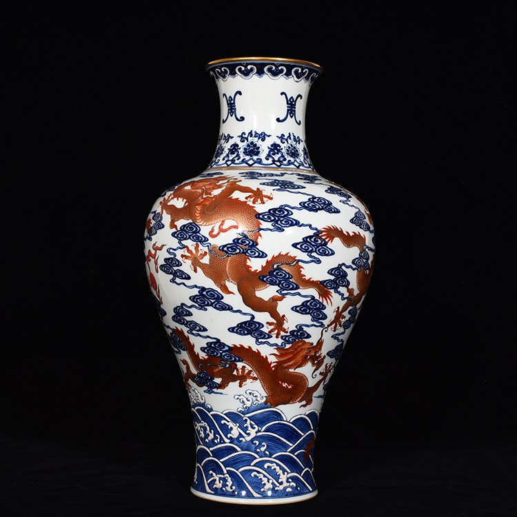 Qing Dynasty Qianlong blue and white alum red Guanyin vase