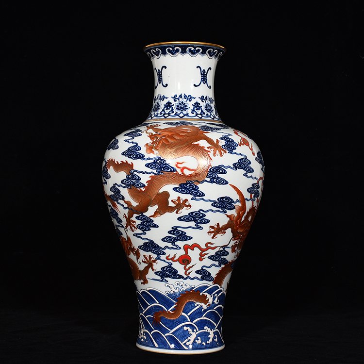 Qing Dynasty Qianlong blue and white alum red Guanyin vase