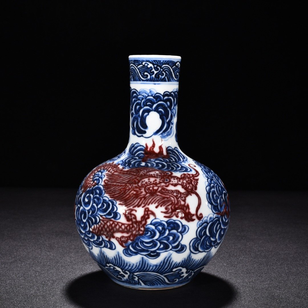 Qing Dynasty Qianlong blue and white underglaze red celestial sphere vase