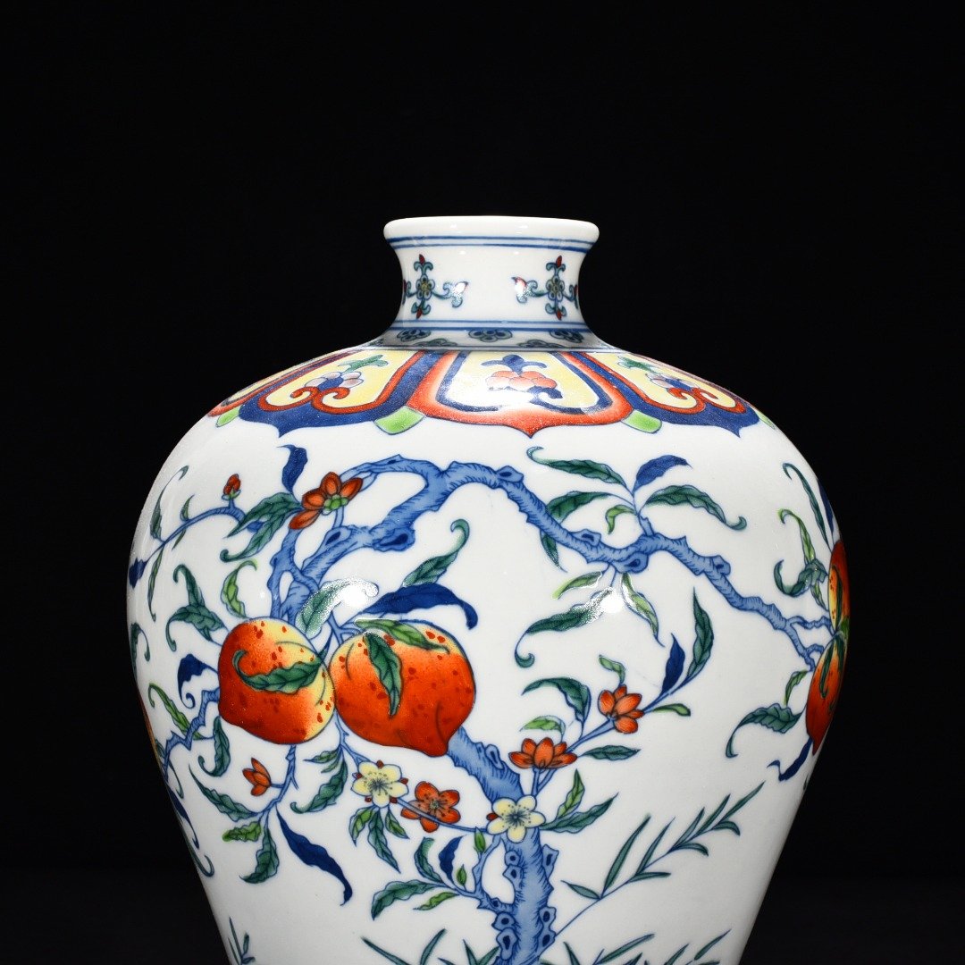 Qing Dynasty Yongzheng Doucai Fushou flower pattern plum vase