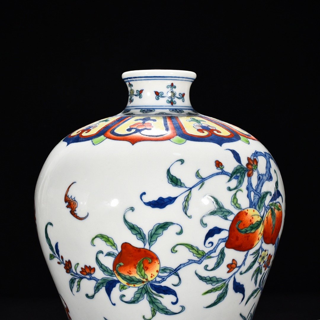 Qing Dynasty Yongzheng Doucai Fushou flower pattern plum vase