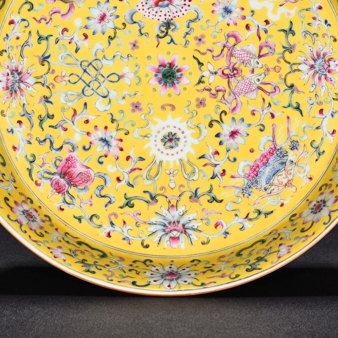 Qing Dynasty Yongzheng alum red and yellow ground plate
