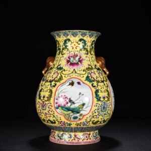 Qing Dynasty Yongzheng yellow ground with rolling pattern vase statue