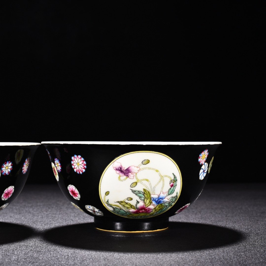 Qing Dynasty Yongzheng black ground enamel poppy bowl