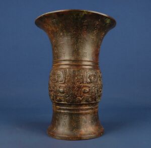 Zhou Dynasty Bronze animal faced round statue