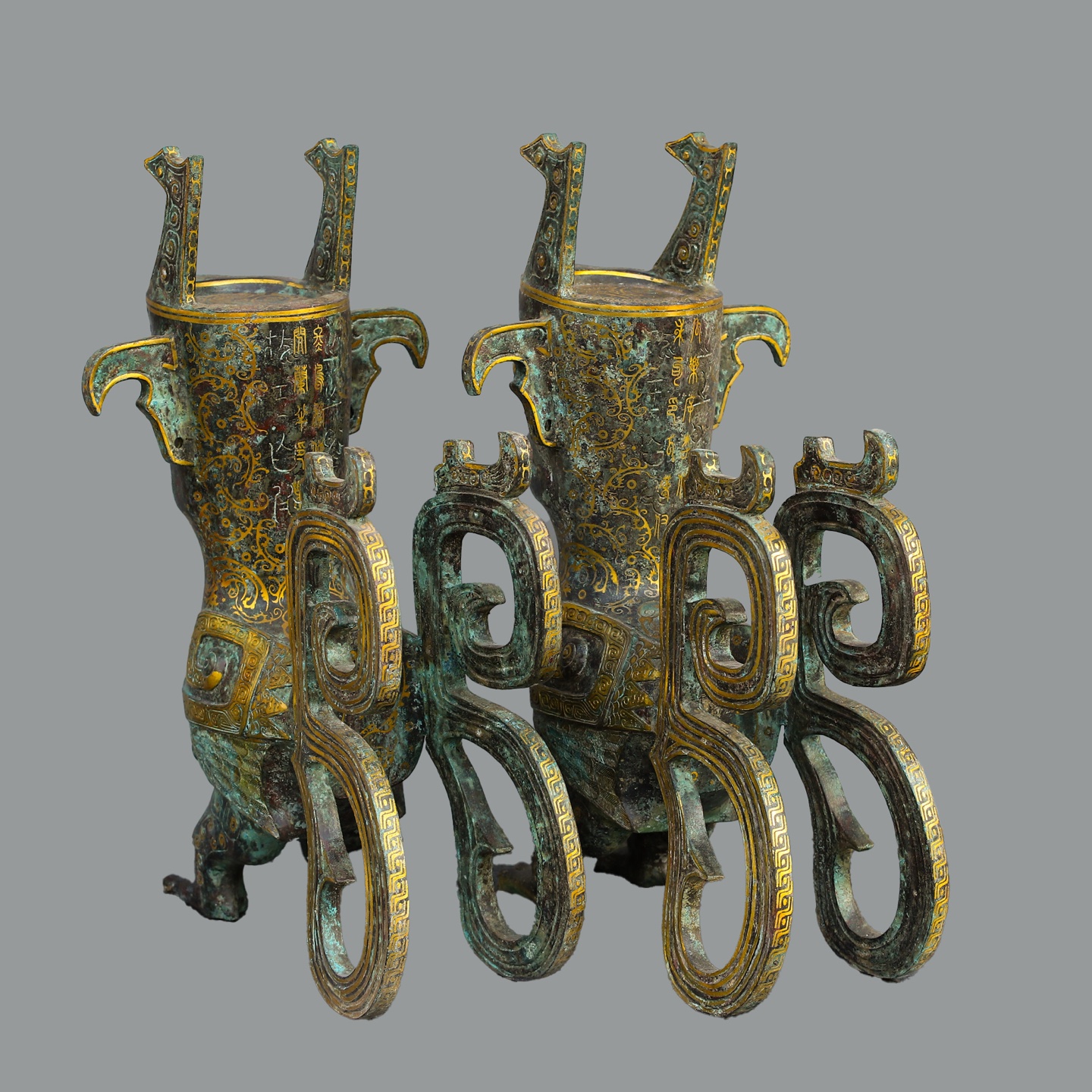 Sanxingdui Dynasty Pair of golden human faced beasts