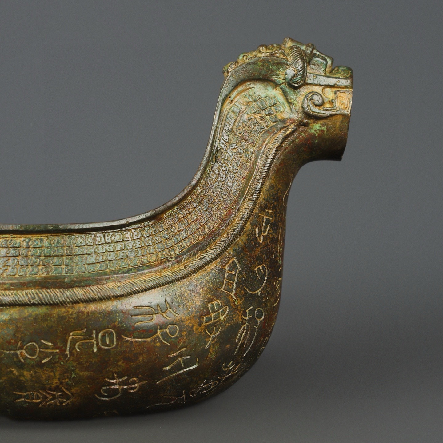 Zhou Dynasty Bronze animal head inscription