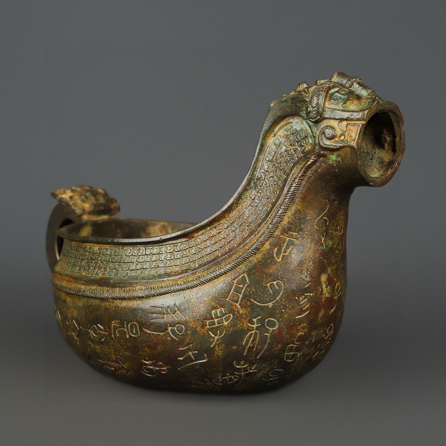 Zhou Dynasty Bronze animal head inscription
