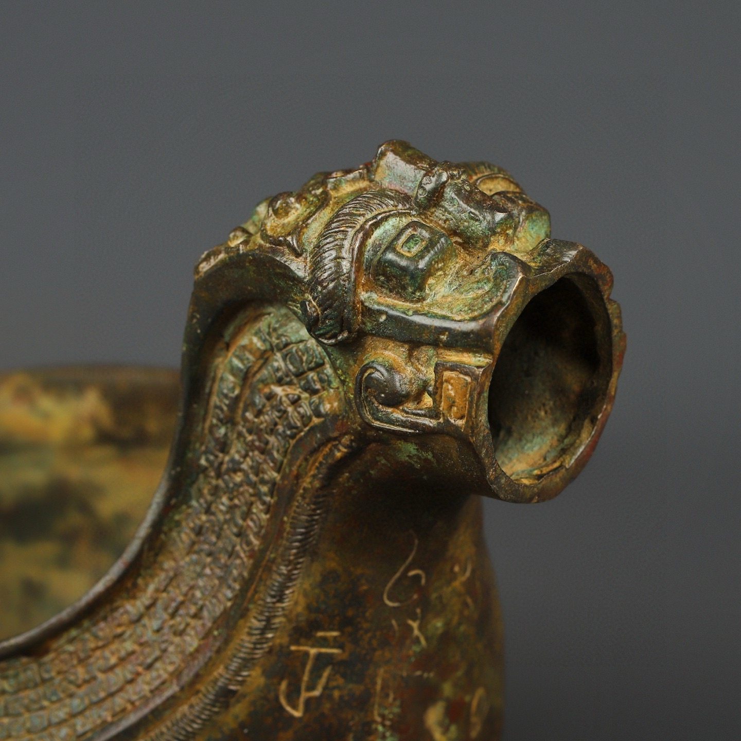 Zhou Dynasty Bronze animal head inscription