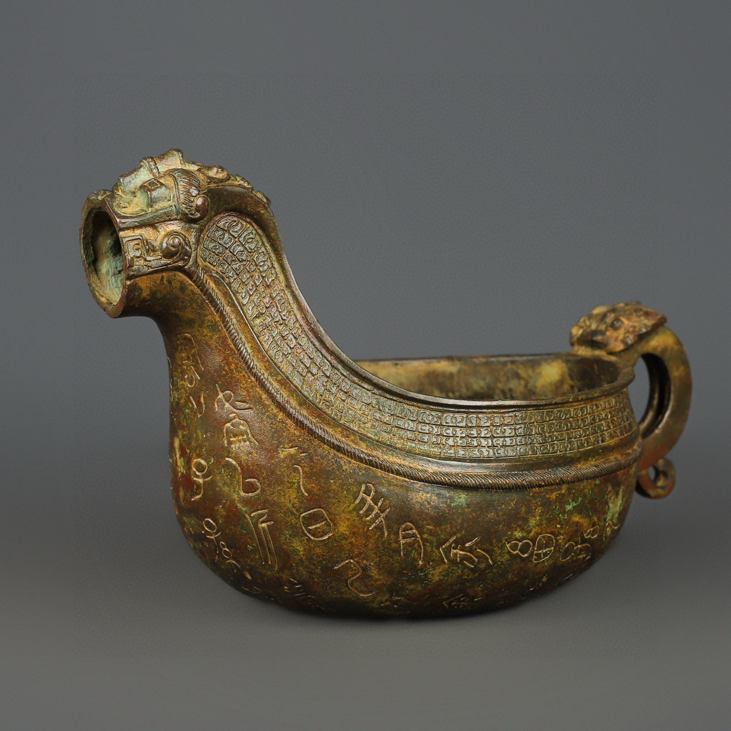 Zhou Dynasty Bronze animal head inscription