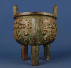 Zhou Dynasty Bronze animal faced round tripod