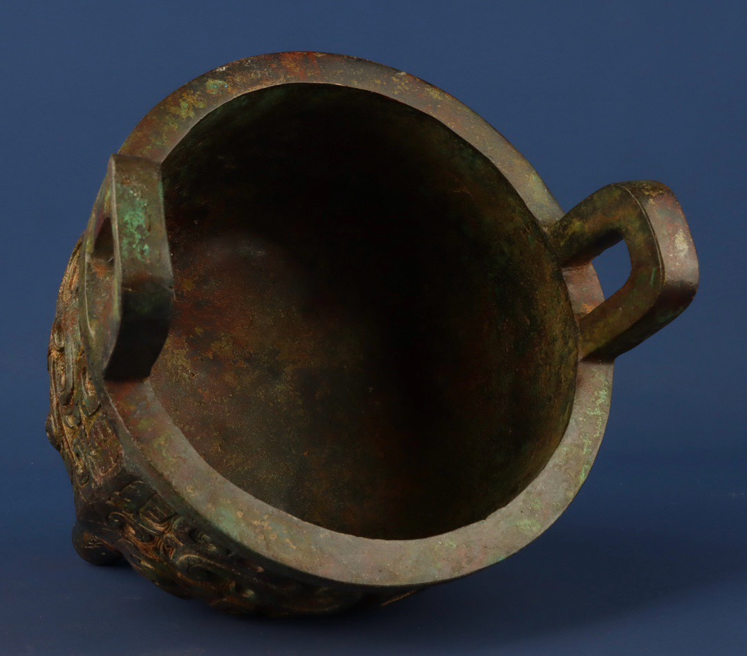 Zhou Dynasty Bronze animal faced round tripod