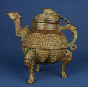 Zhou Dynasty Bronze pot with dragon and phoenix heads