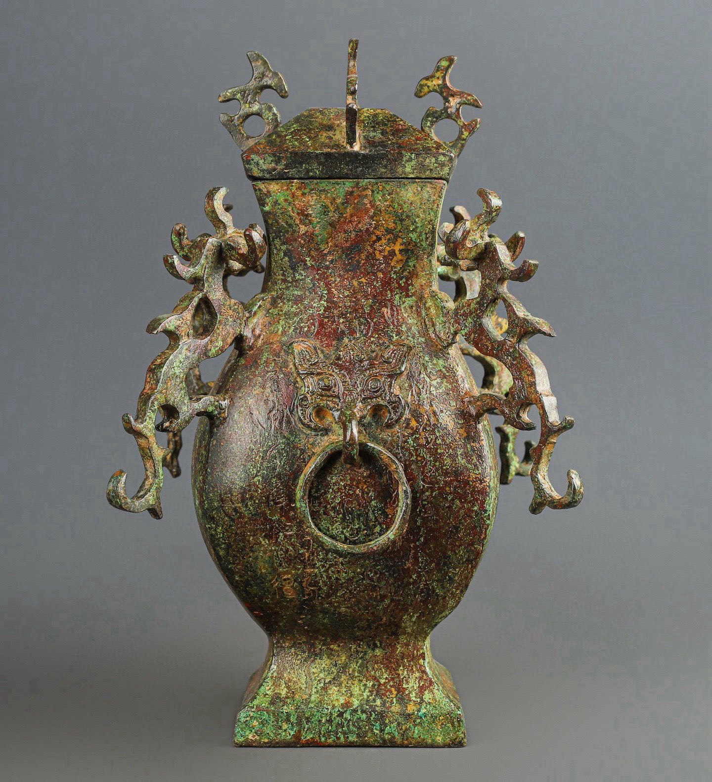 Han Dynasty Bronze square vase with four dragons inscription