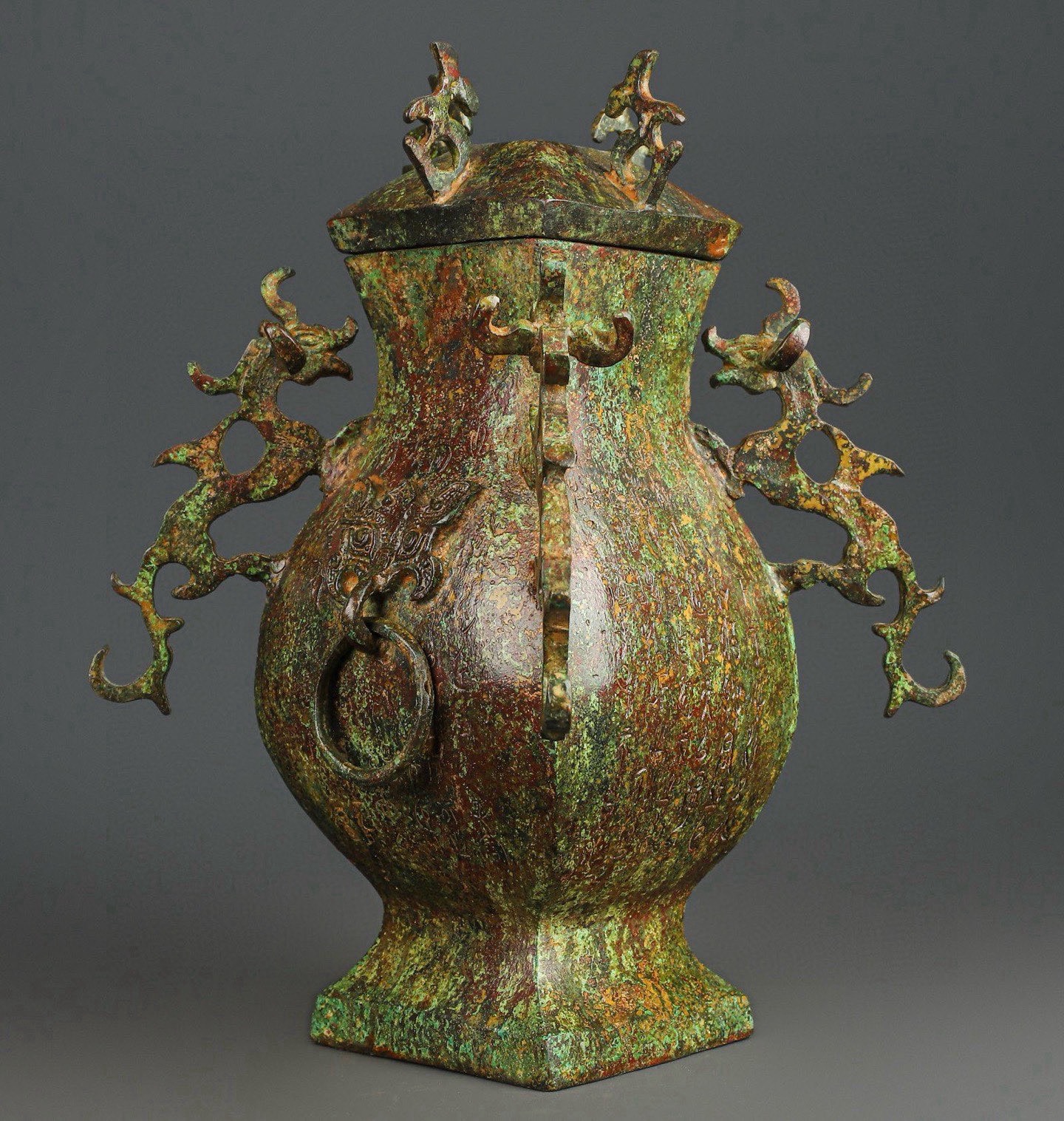 Han Dynasty Bronze square vase with four dragons inscription