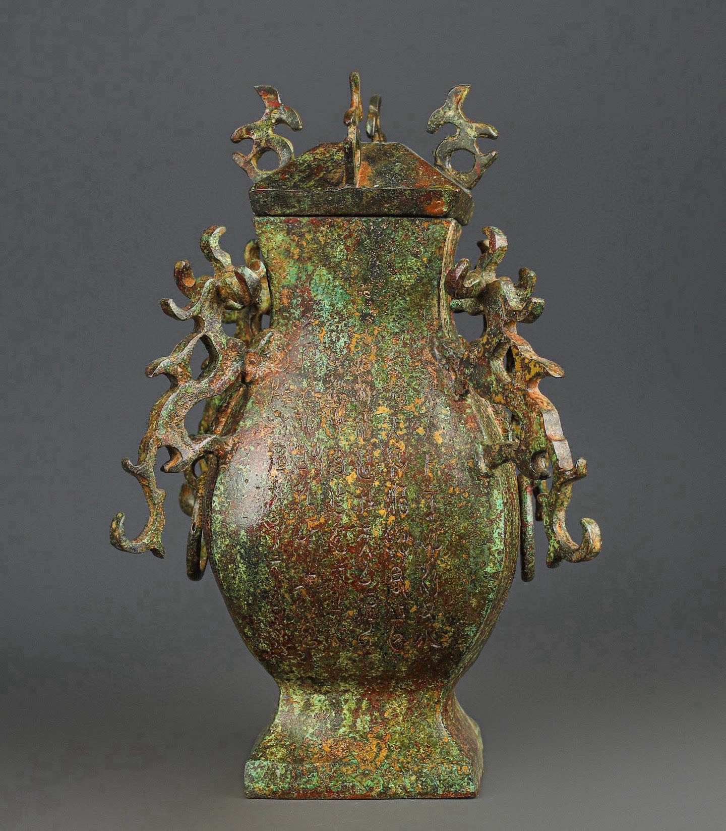 Han Dynasty Bronze square vase with four dragons inscription
