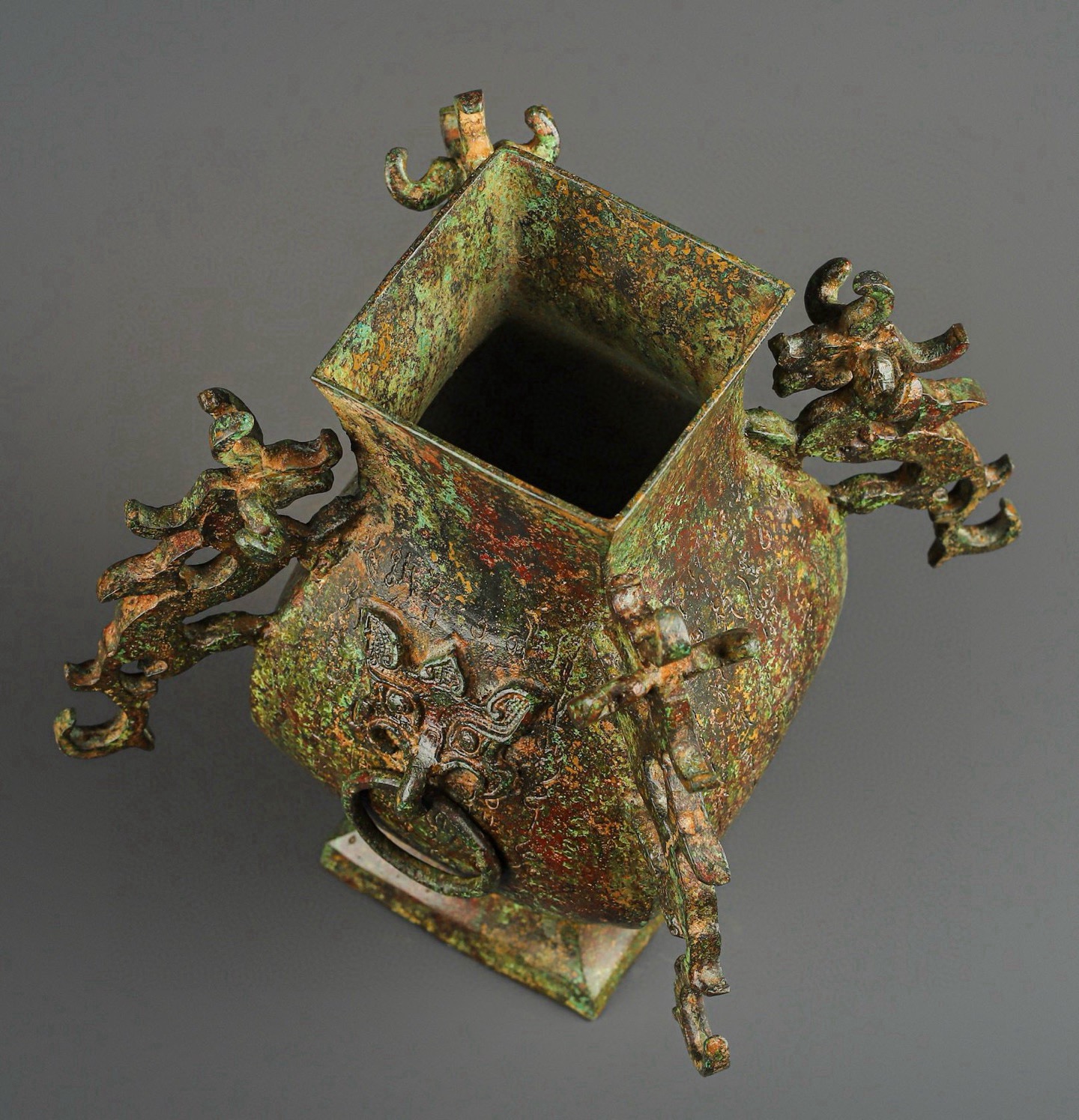 Han Dynasty Bronze square vase with four dragons inscription
