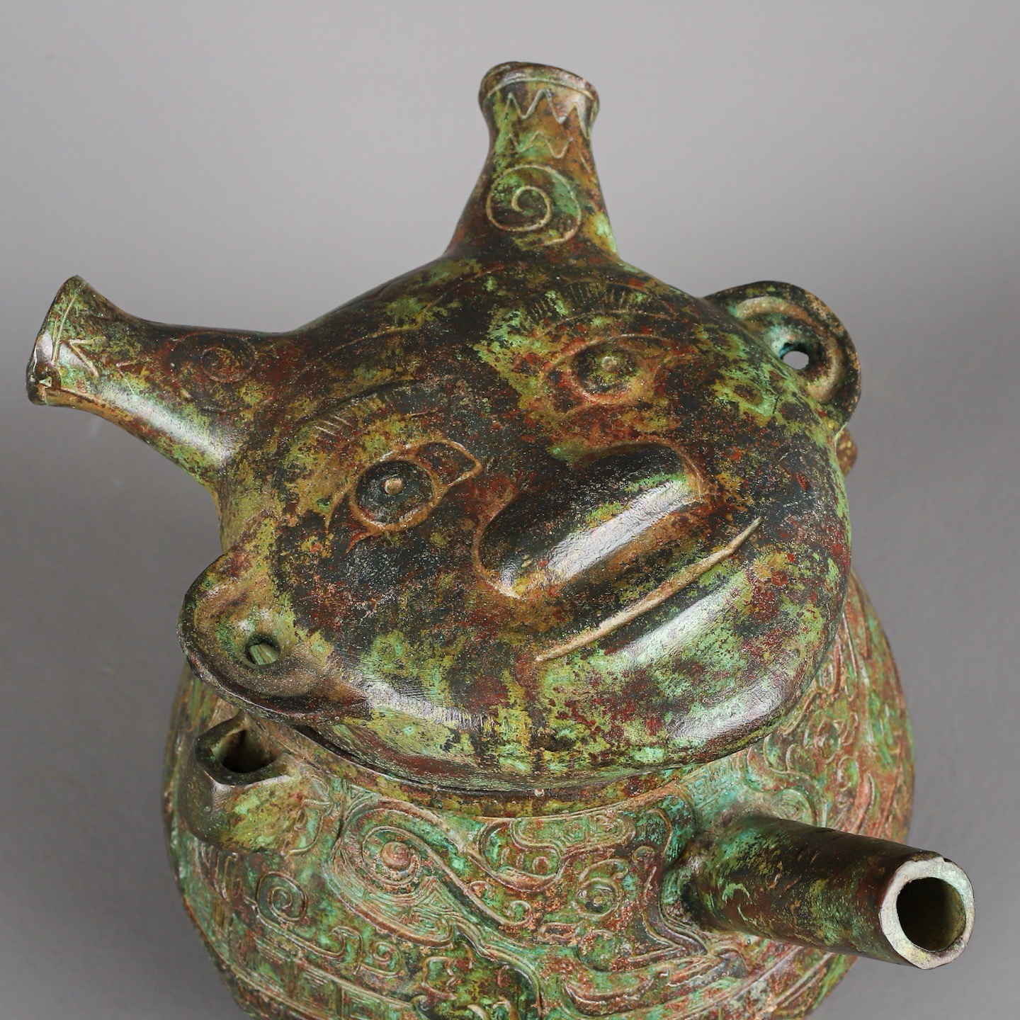 Zhou Dynasty Bronze Human Face Pot
