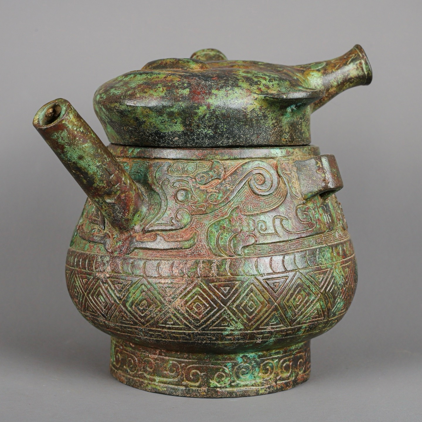 Zhou Dynasty Bronze Human Face Pot