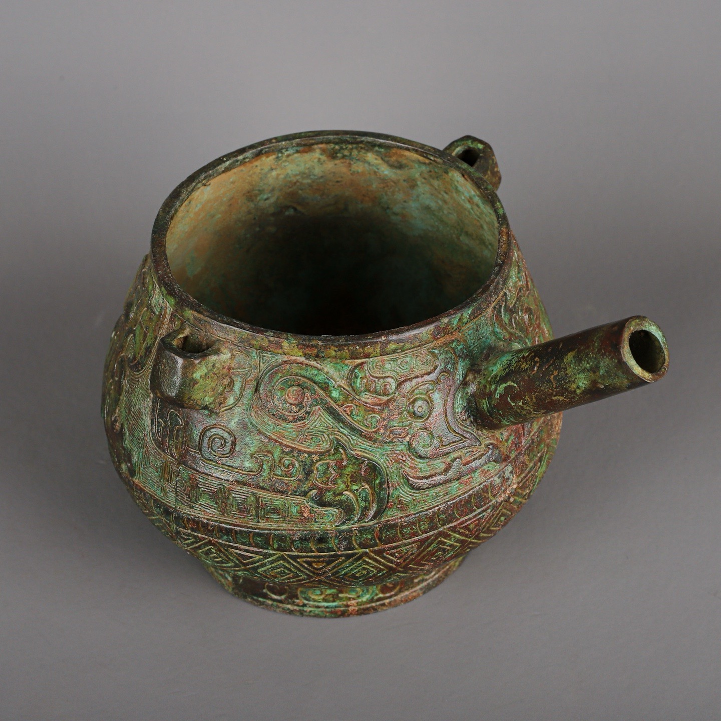Zhou Dynasty Bronze Human Face Pot