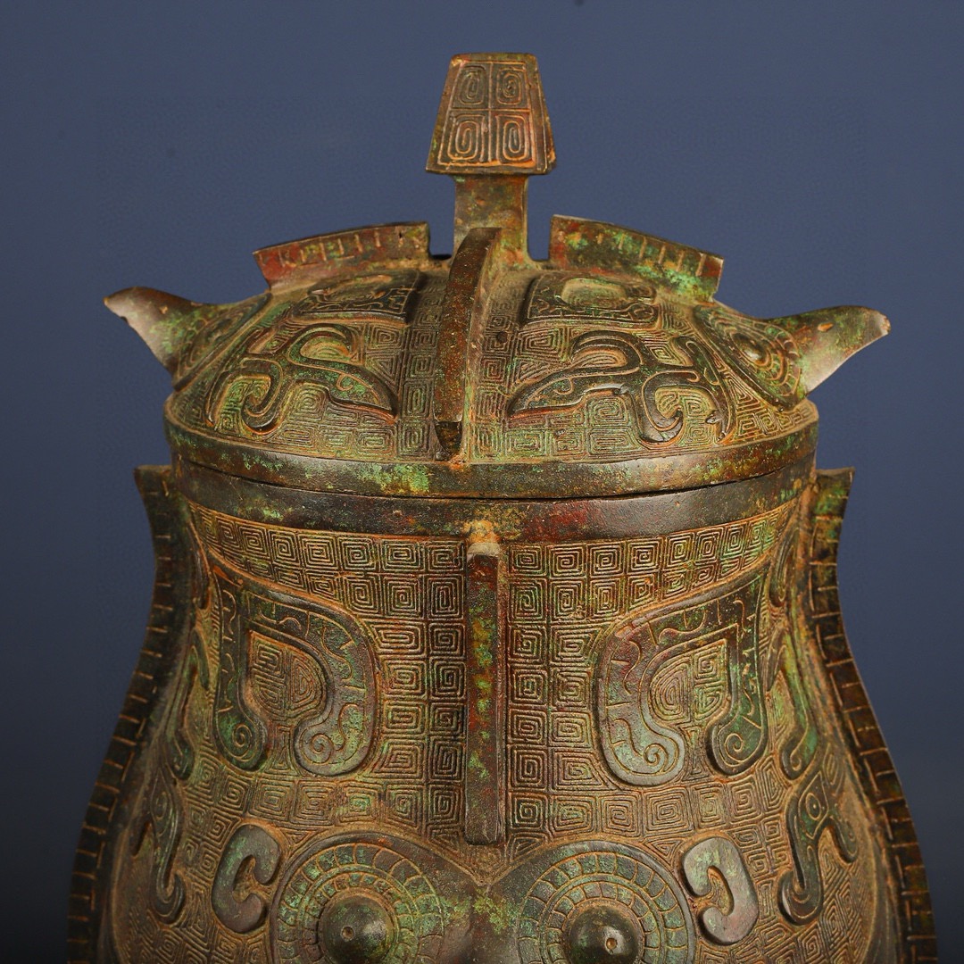 Zhou Dynasty Bronze Eagle Face Wine Arrival