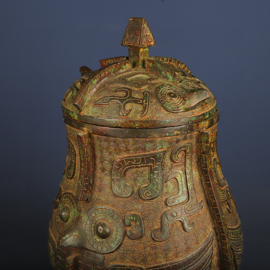 Zhou Dynasty Bronze Eagle Face Wine Arrival