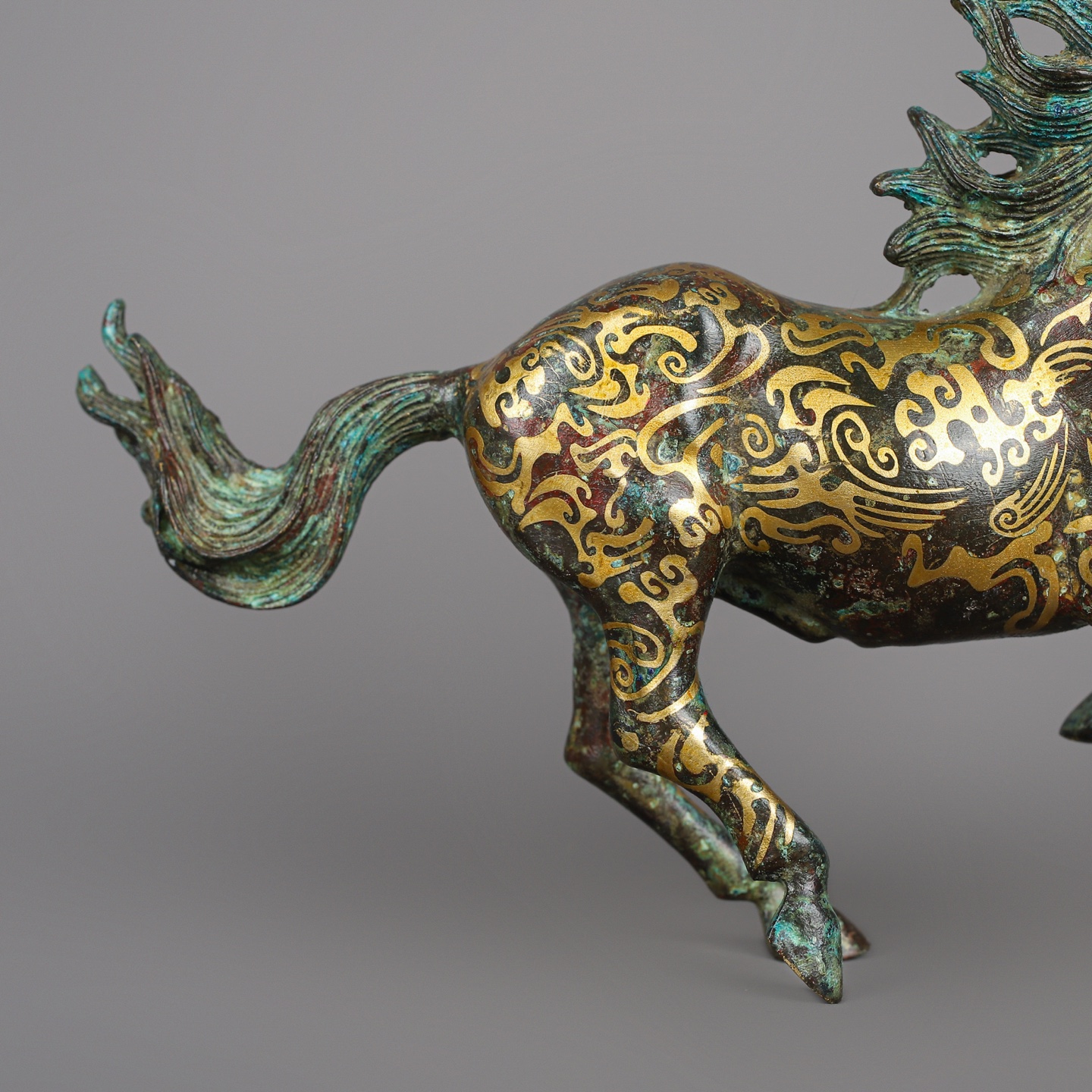 Han Dynasty Bronze and Gold Galloping Horse