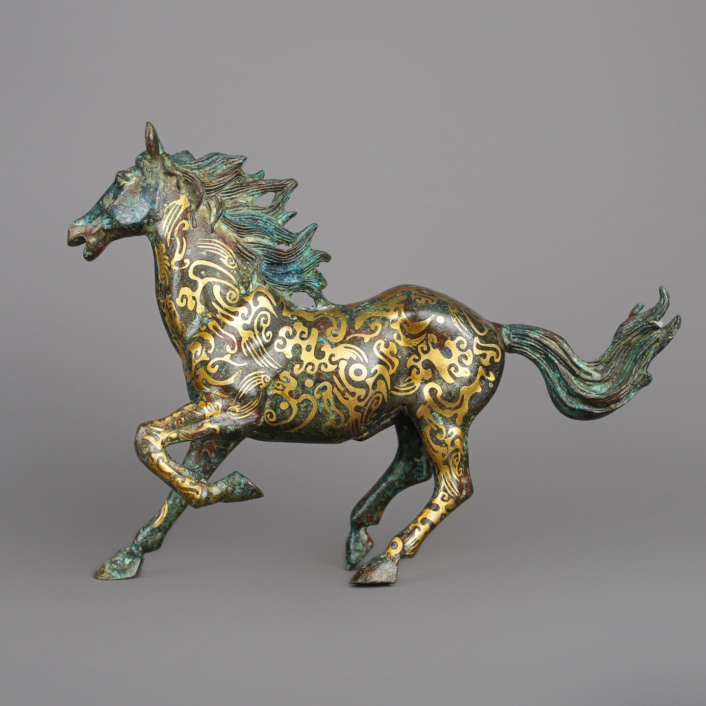 Han Dynasty Bronze and Gold Galloping Horse
