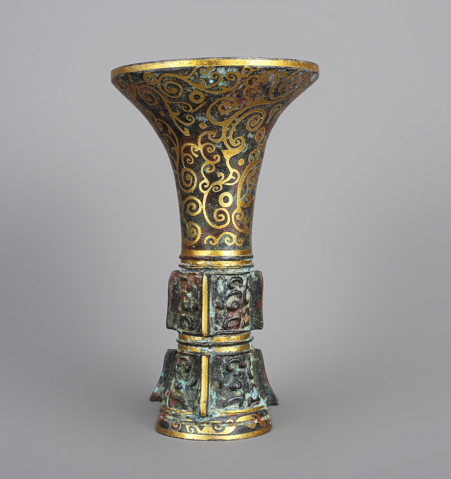 Han Dynasty A pair of bronze and gold flower goblets