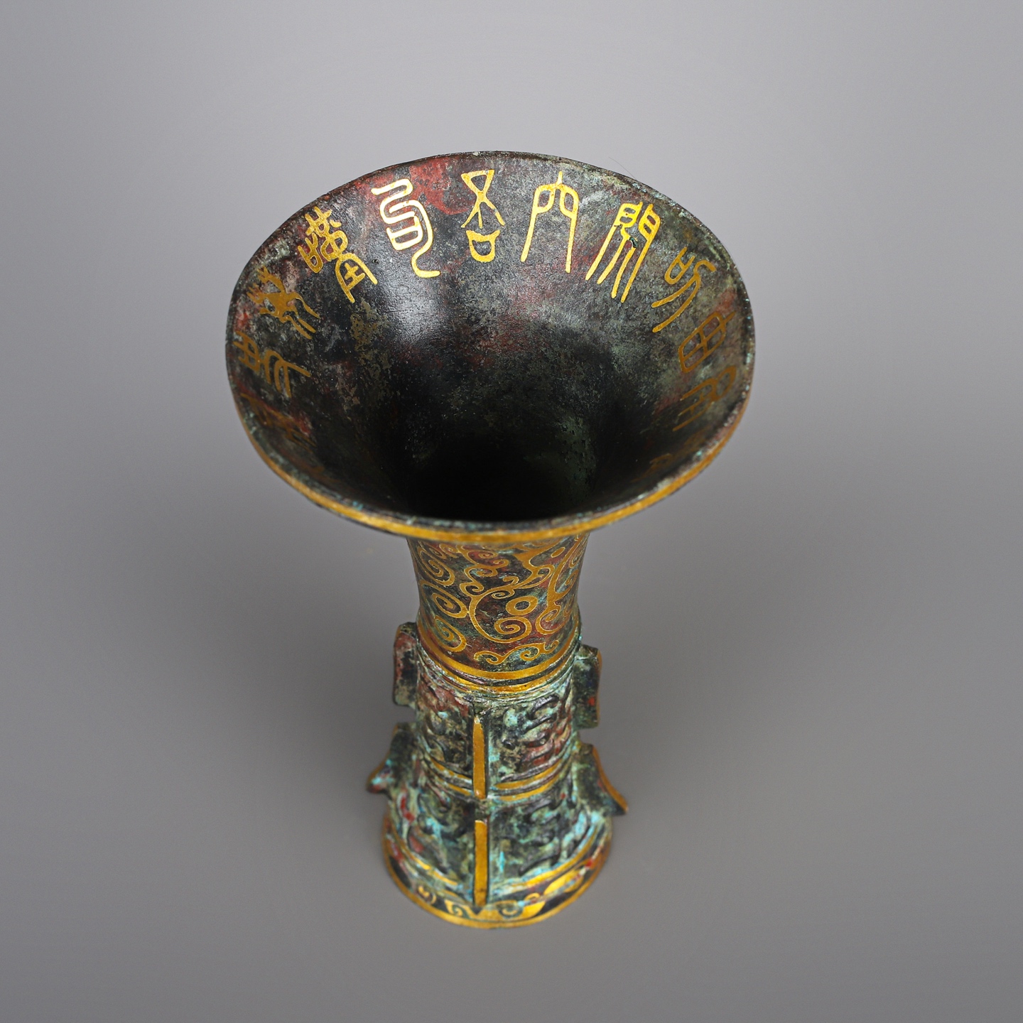 Han Dynasty A pair of bronze and gold flower goblets