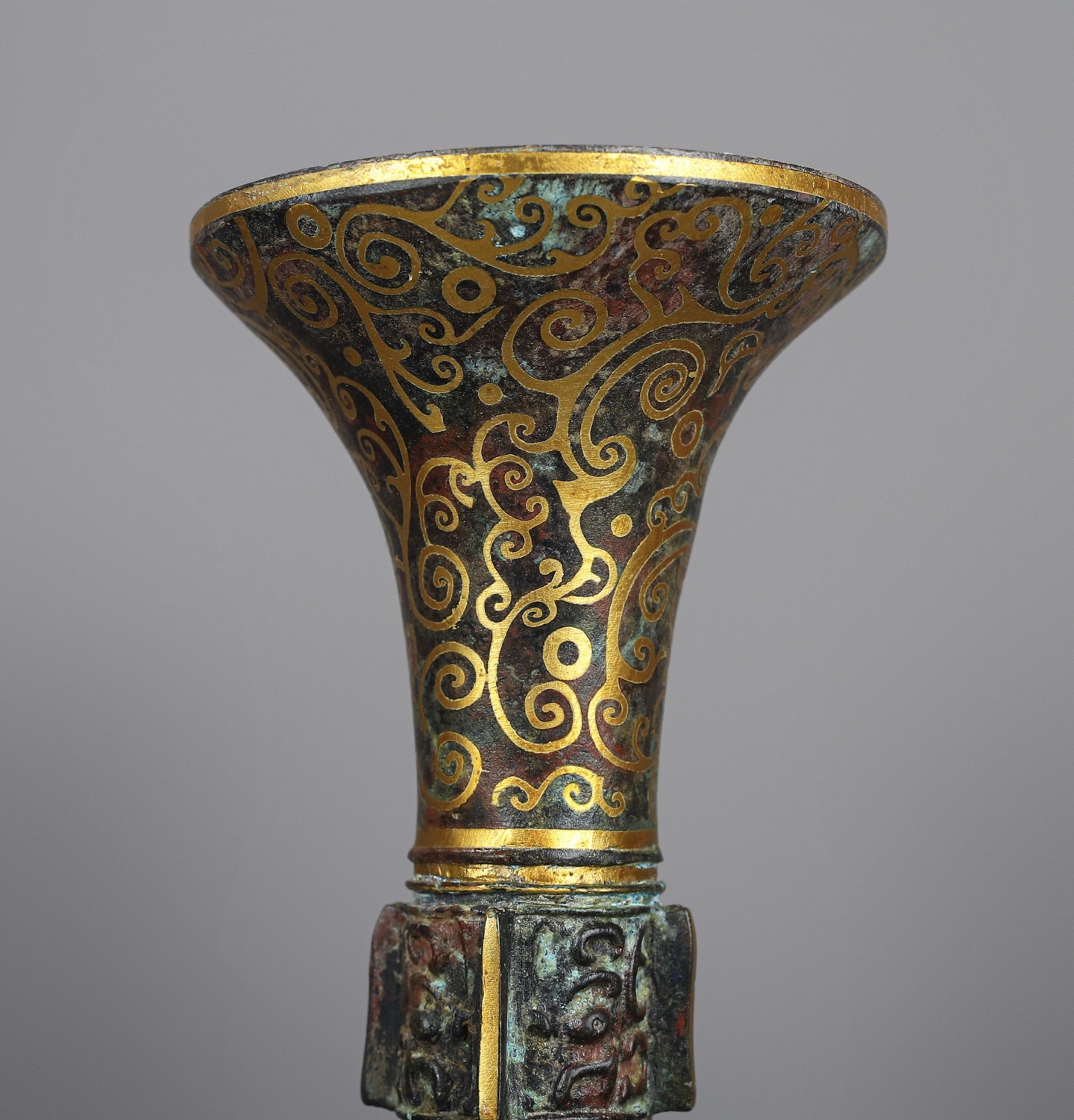 Han Dynasty A pair of bronze and gold flower goblets