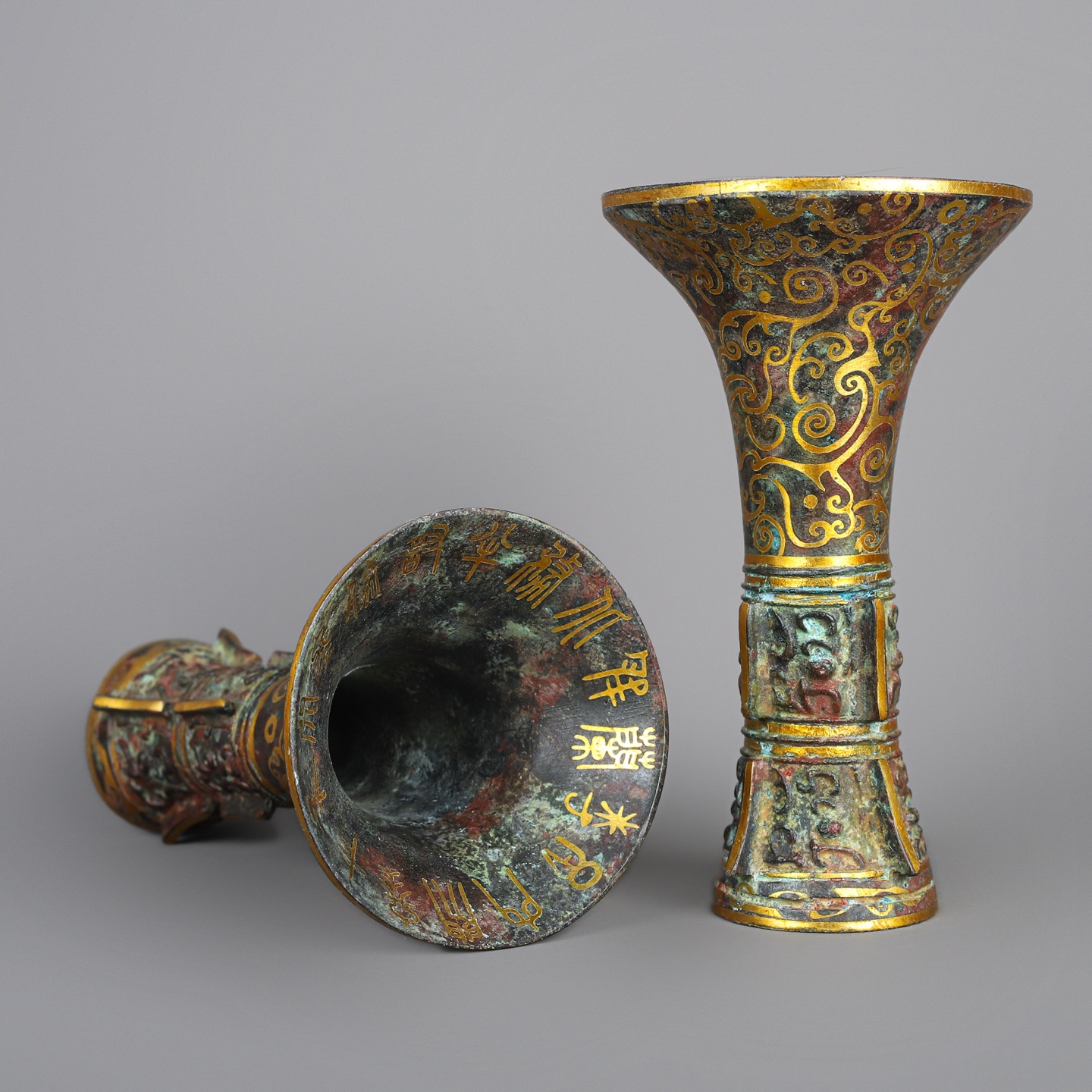 Han Dynasty A pair of bronze and gold flower goblets