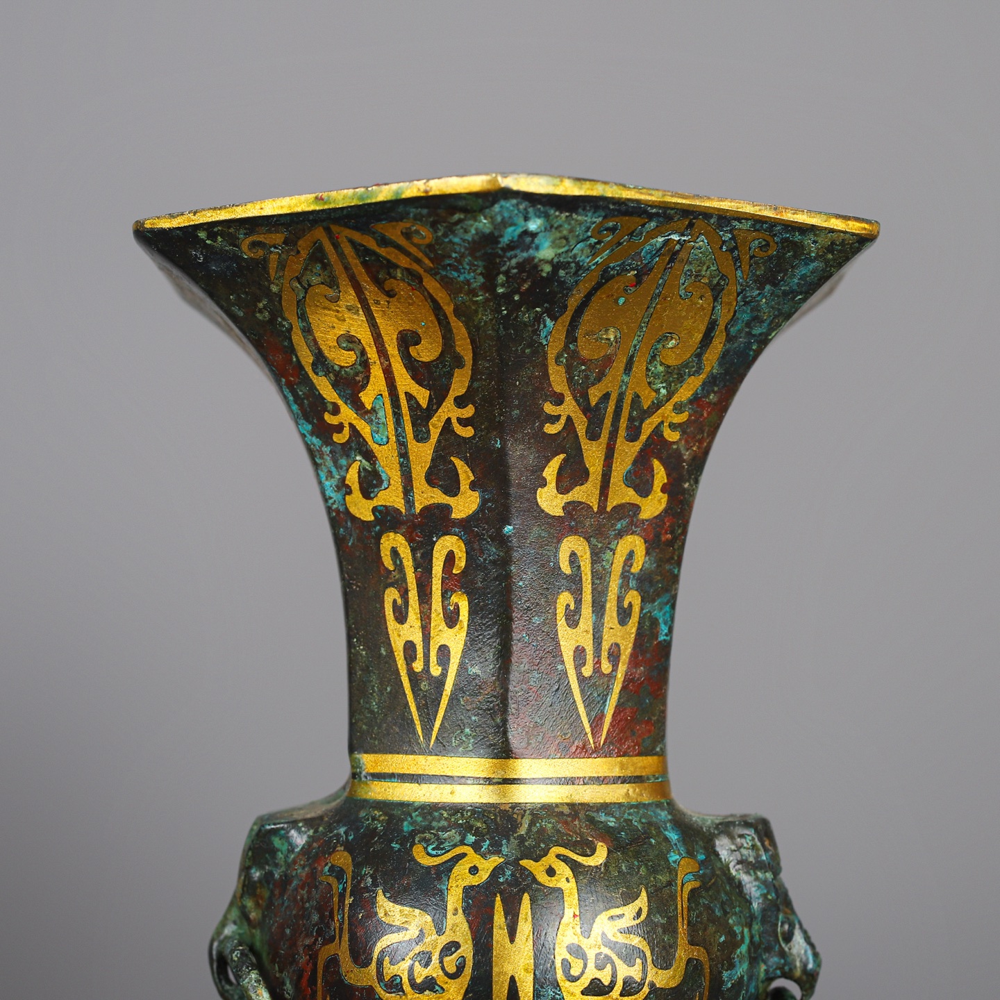 Han Dynasty A pair of bronze and gold six edged statues