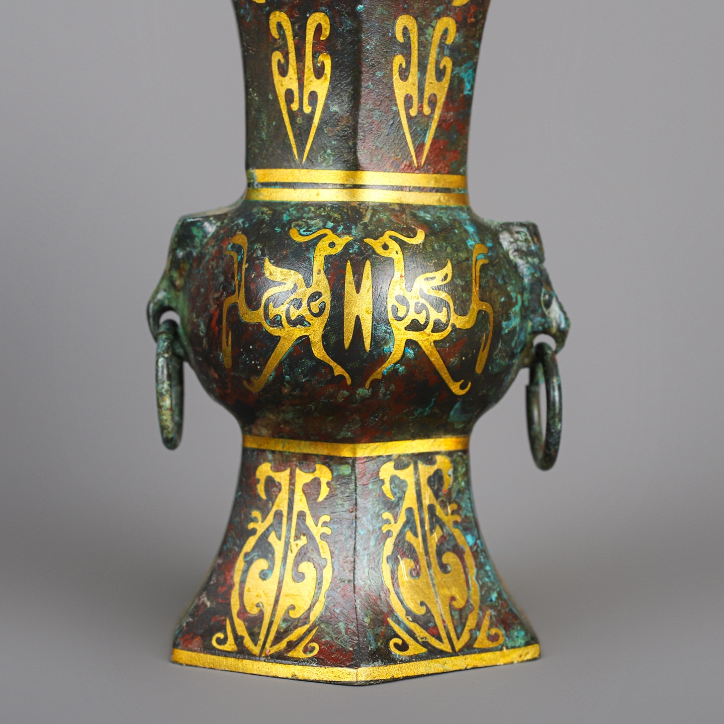 Han Dynasty A pair of bronze and gold six edged statues