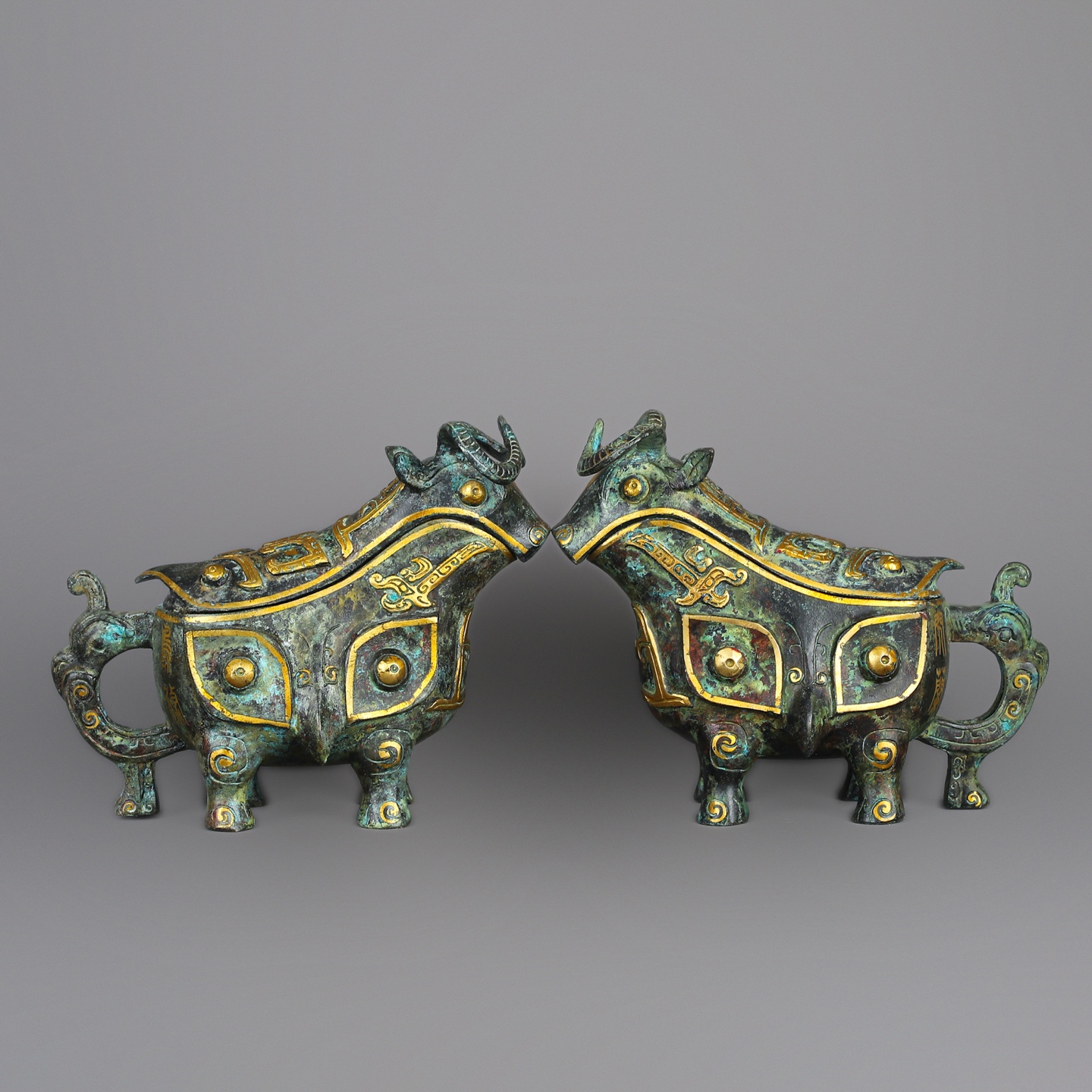 Han Dynasty A pair of bronze and gold beast gongs