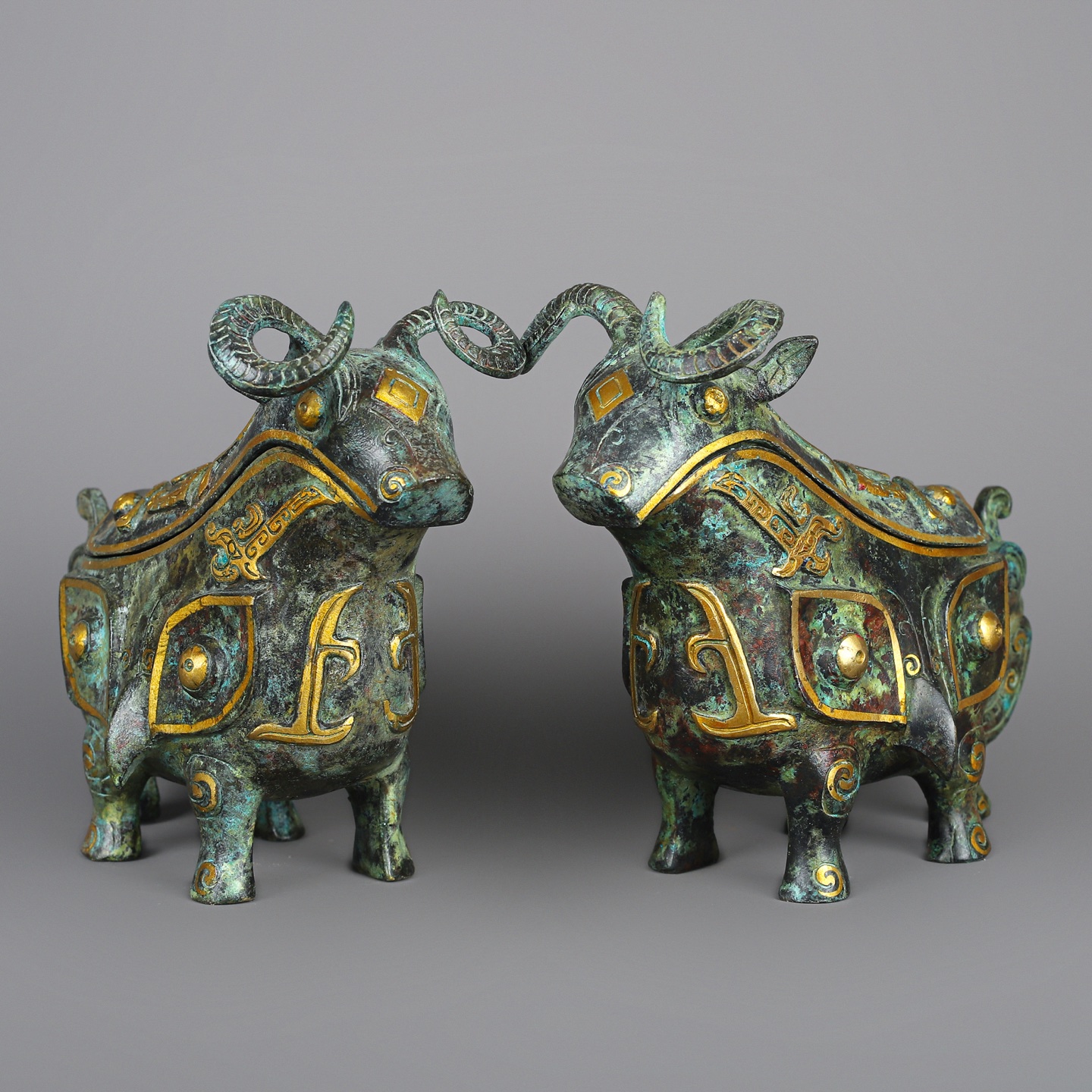 Han Dynasty A pair of bronze and gold beast gongs
