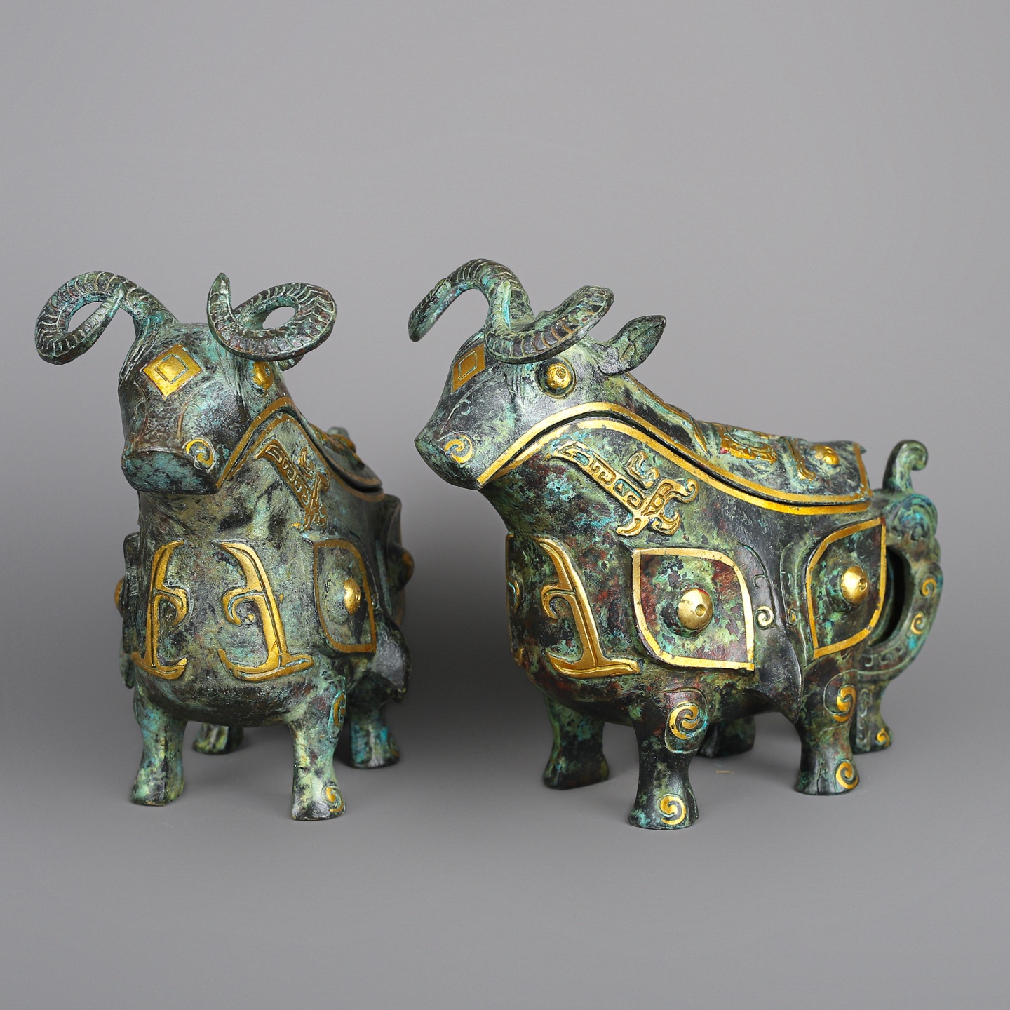 Han Dynasty A pair of bronze and gold beast gongs
