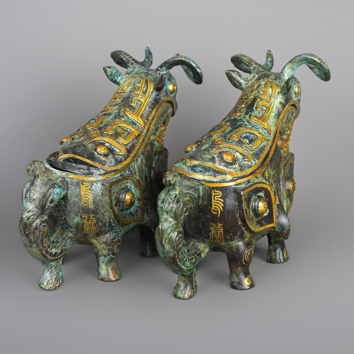 Han Dynasty A pair of bronze and gold beast gongs