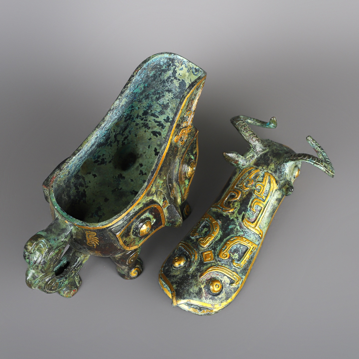 Han Dynasty A pair of bronze and gold beast gongs