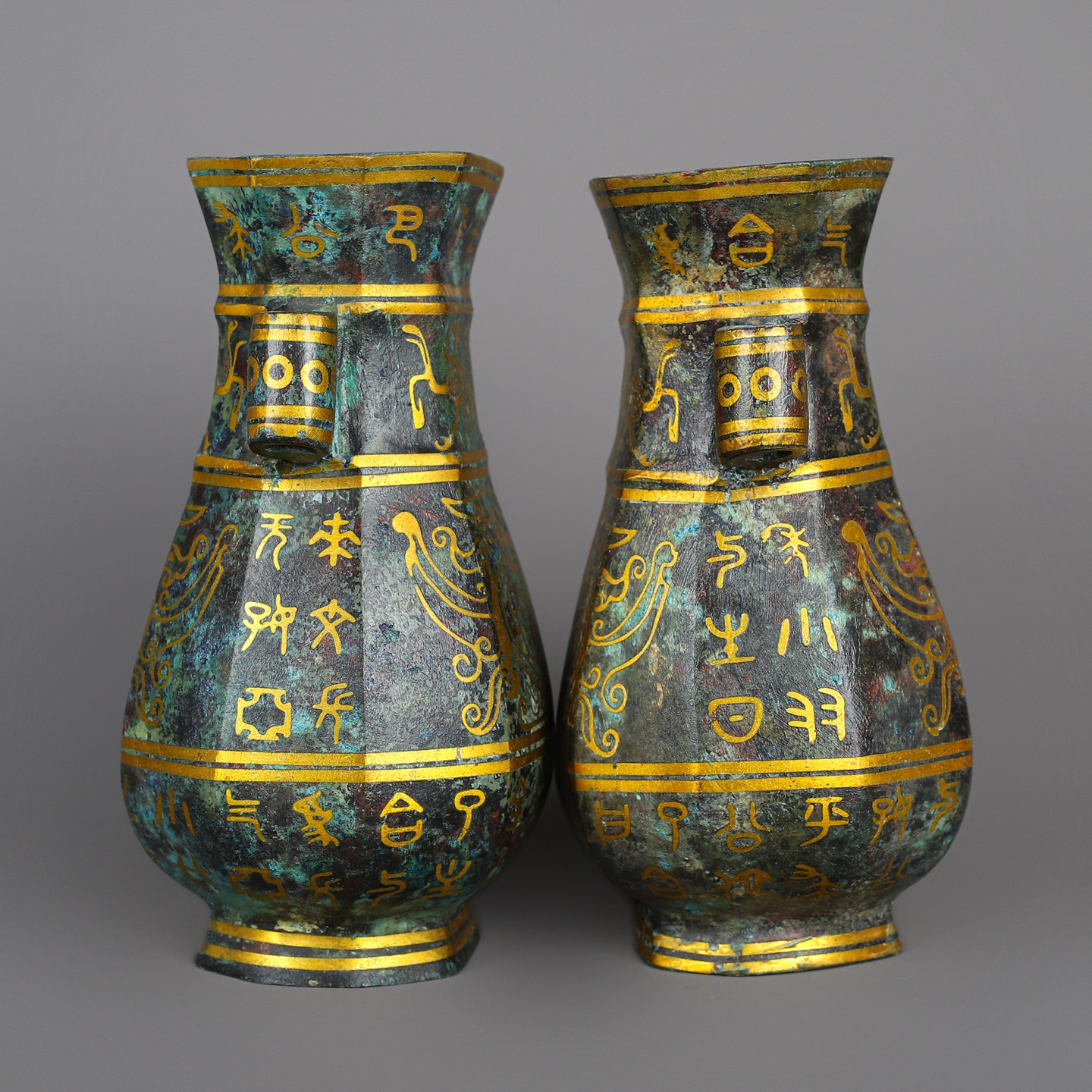 Han Dynasty Pair of bronze and gold double eared square vases