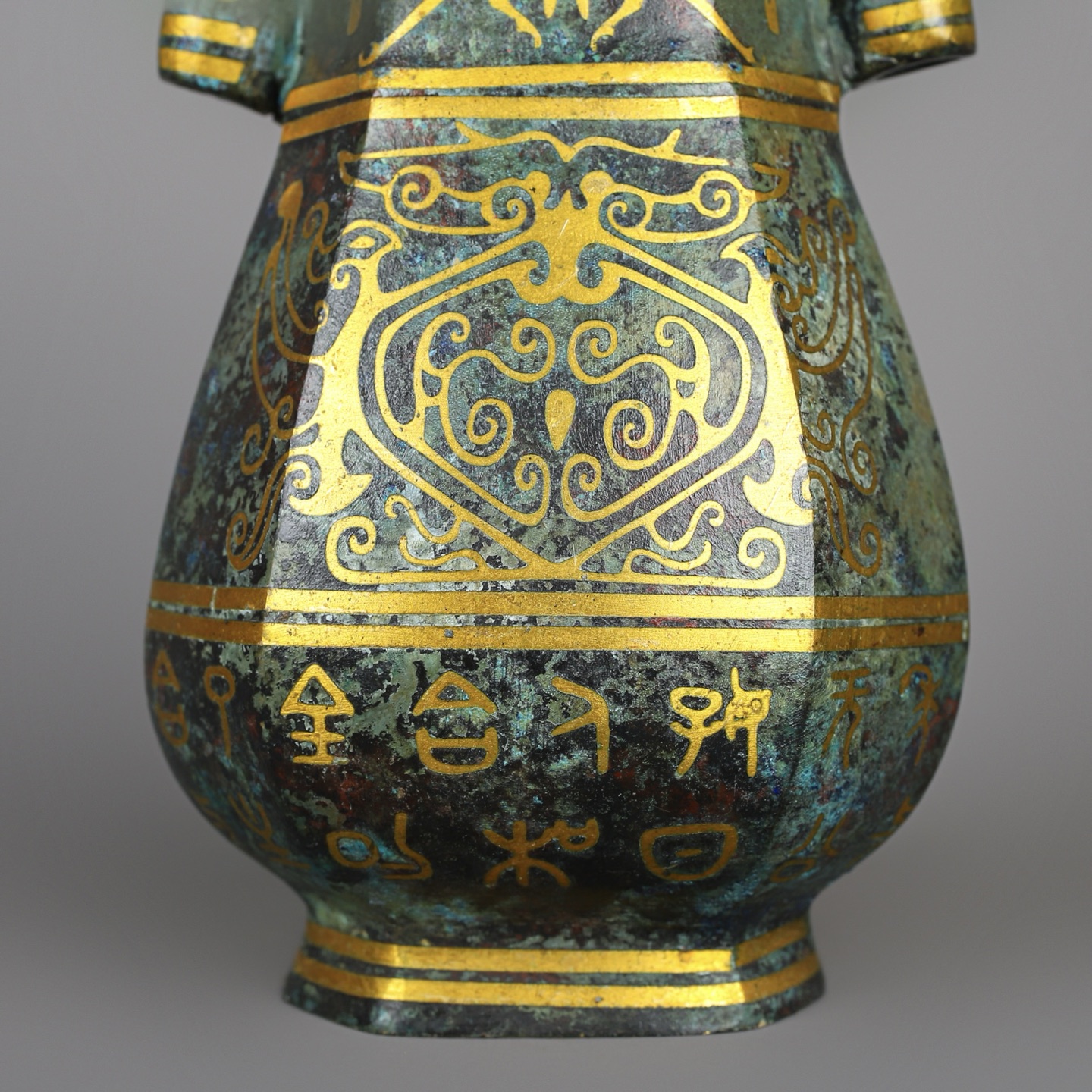 Han Dynasty Pair of bronze and gold double eared square vases