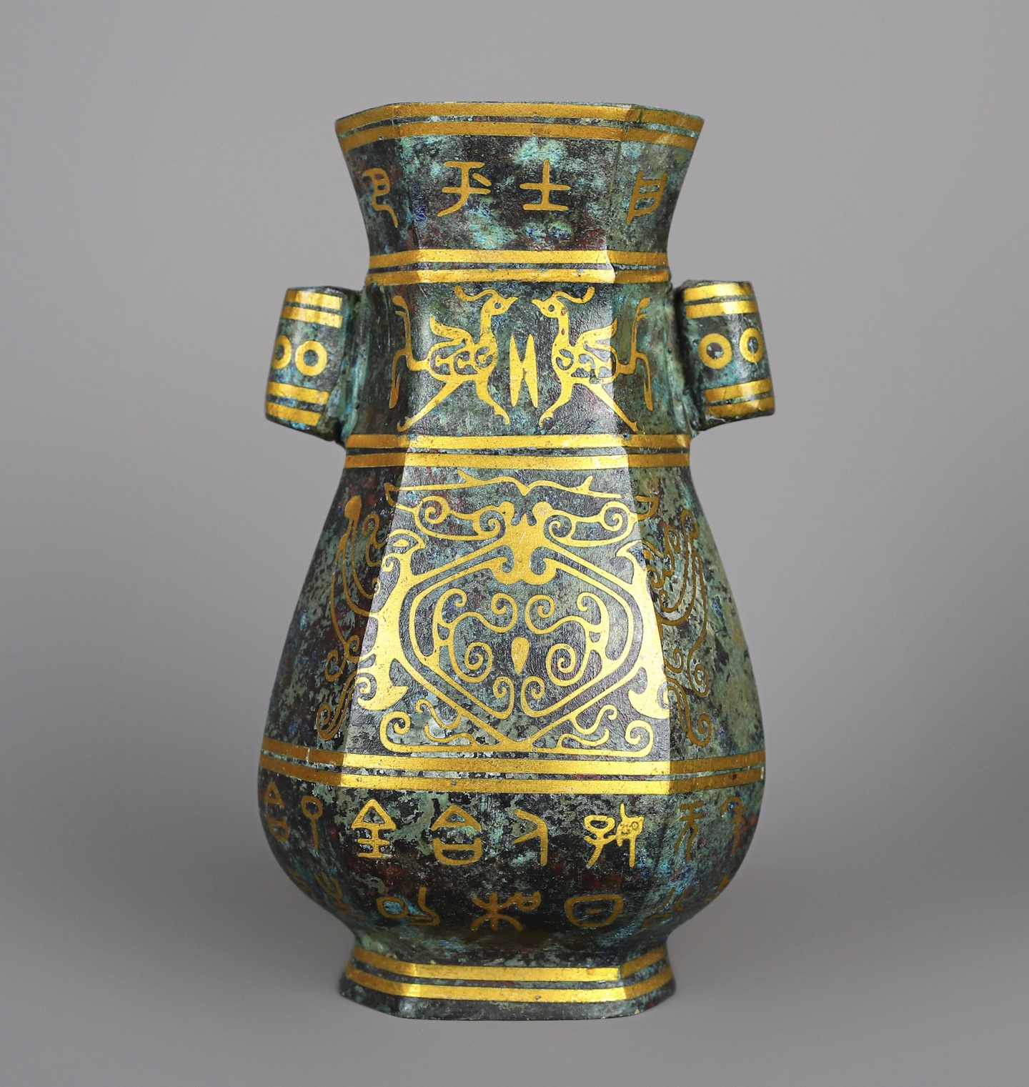 Han Dynasty Pair of bronze and gold double eared square vases