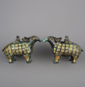 Zhou Dynasty A pair of bronze and gold beast statues