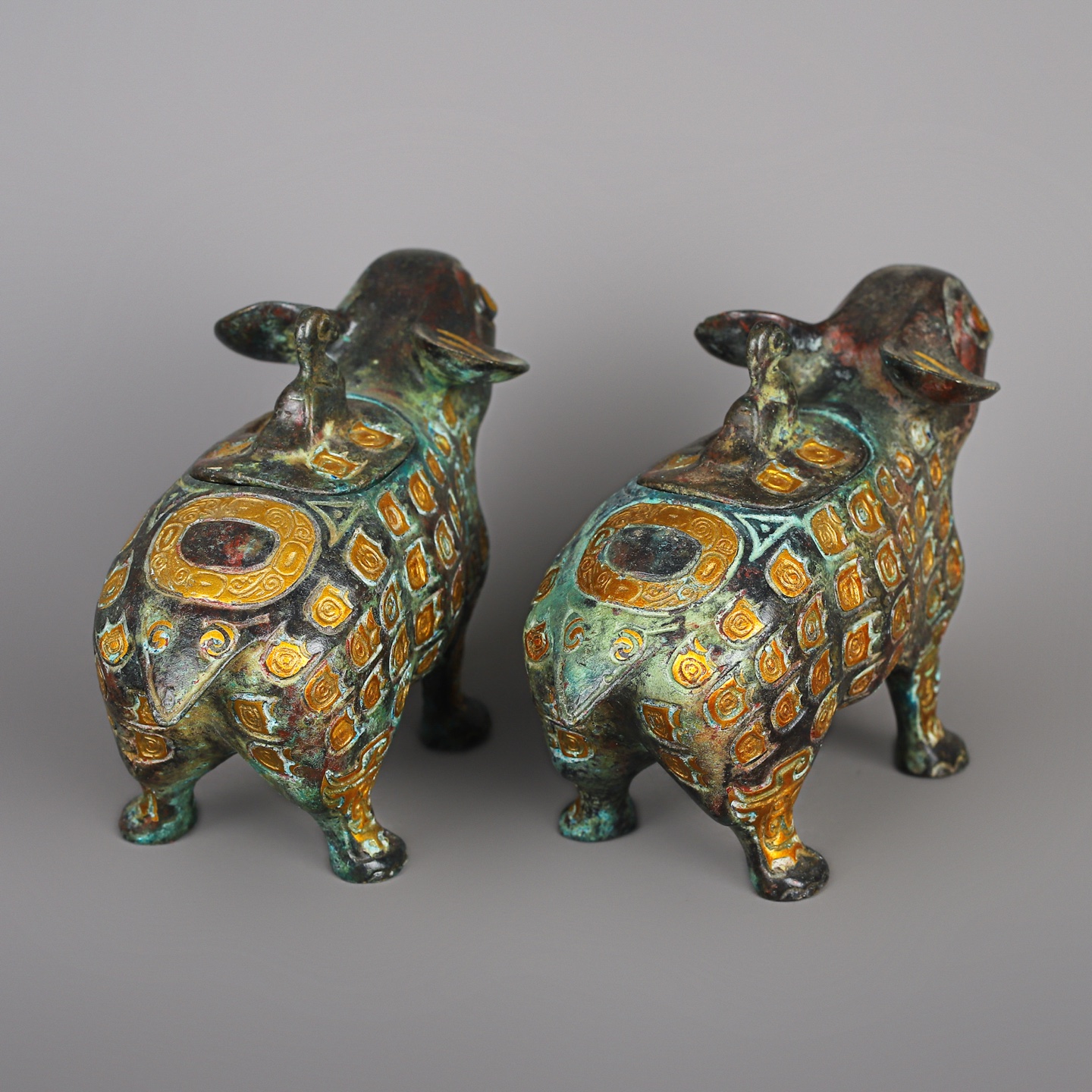 Zhou Dynasty A pair of bronze and gold beast statues