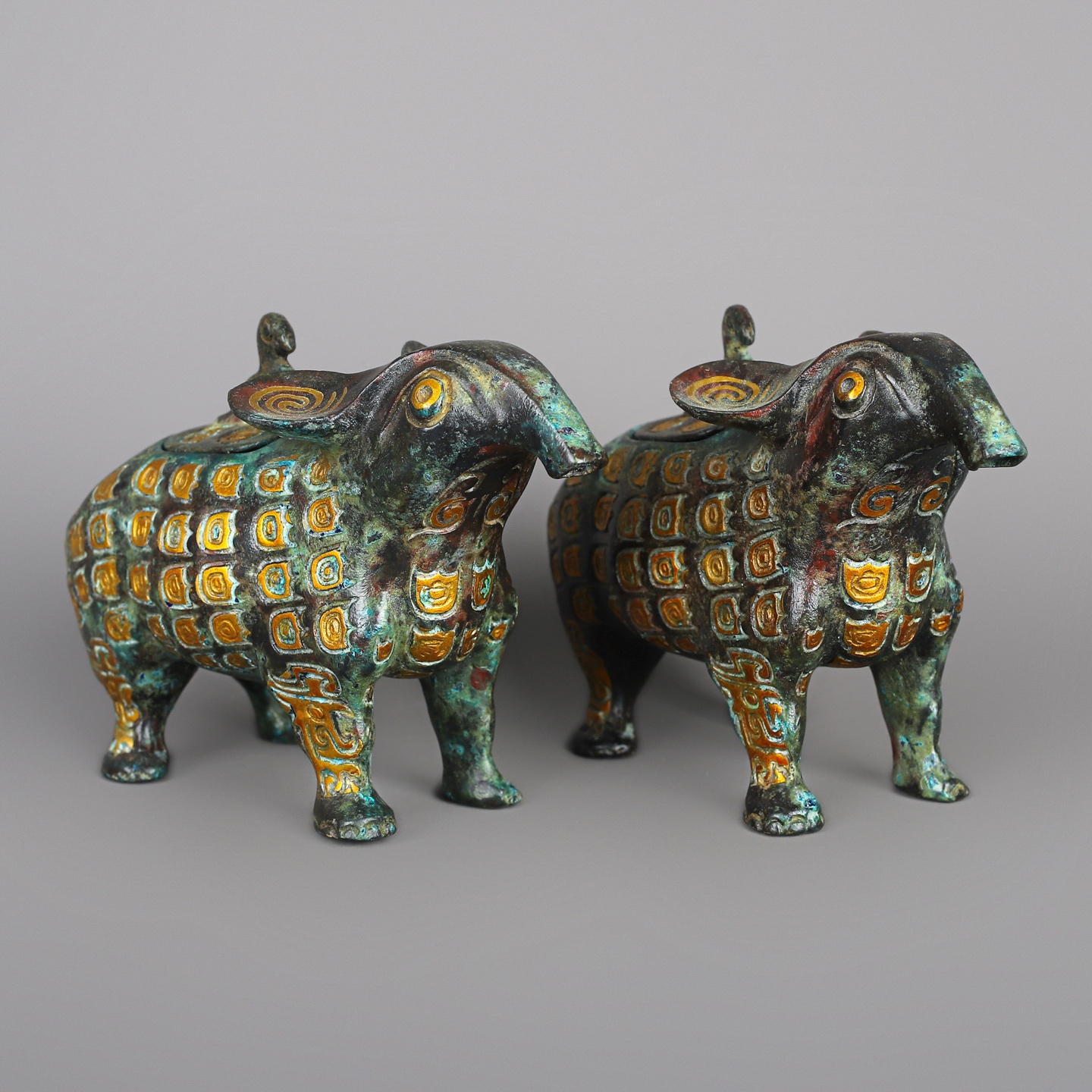 Zhou Dynasty A pair of bronze and gold beast statues