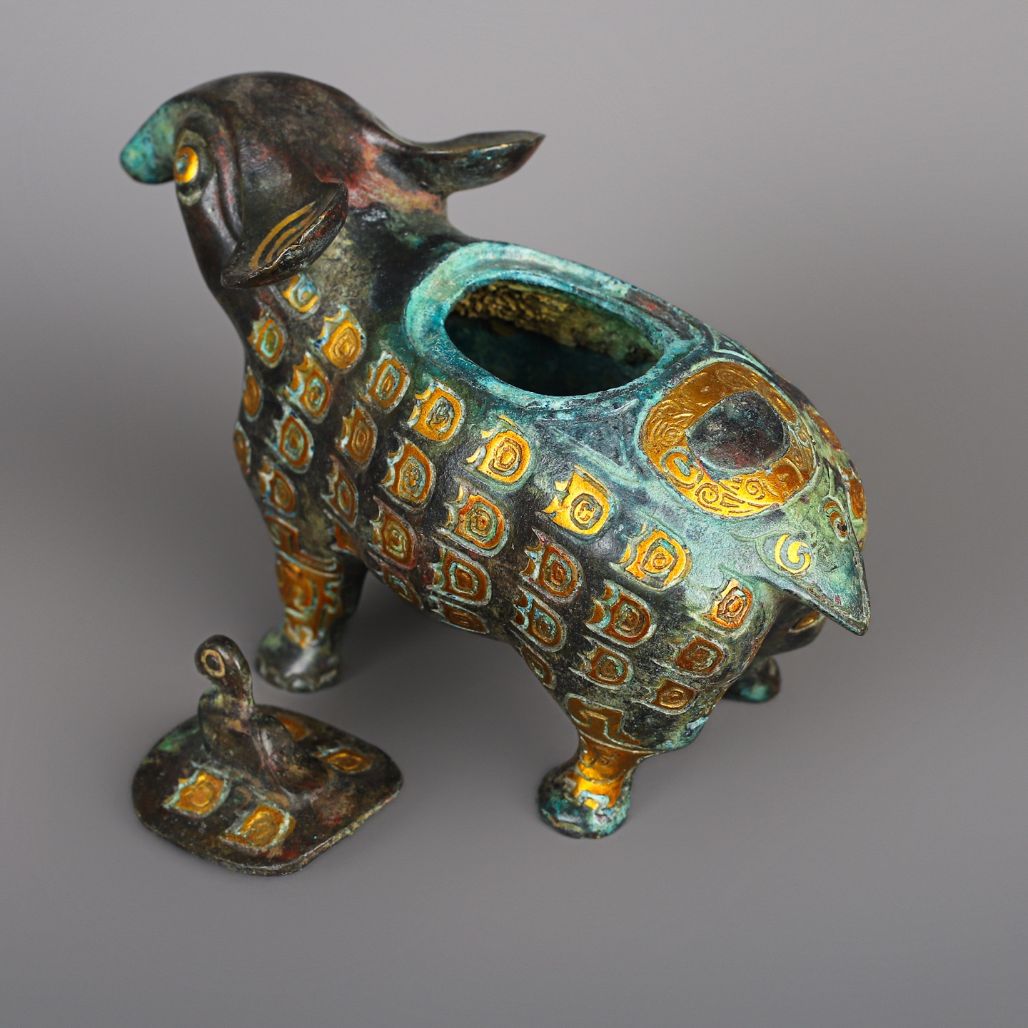 Zhou Dynasty A pair of bronze and gold beast statues