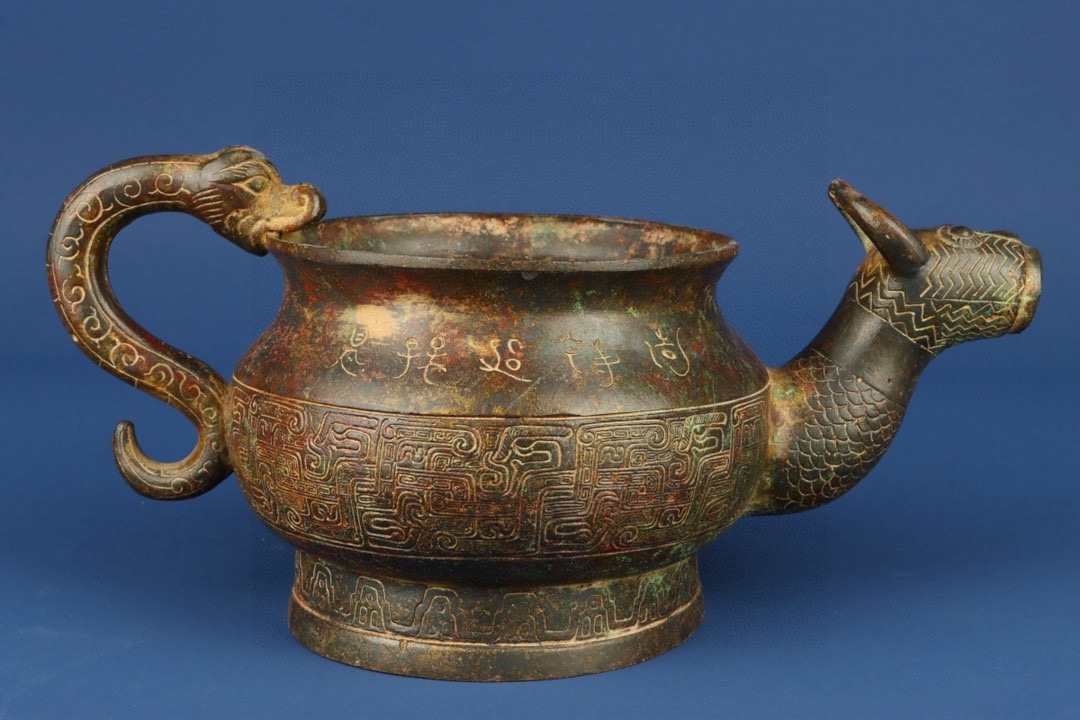 Zhou Dynasty Bronze Beast Head Pot